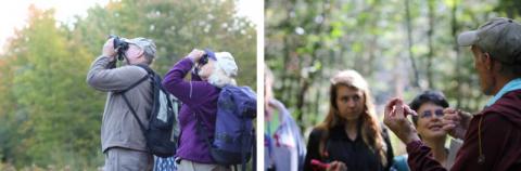 People look through binoculars and gather for the event