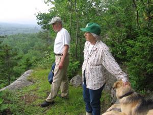 people standing in the woods